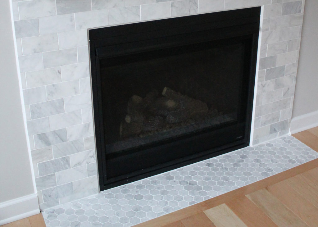Carrara Marble Fireplace Example, How To Install Marble Tile Around Fireplace