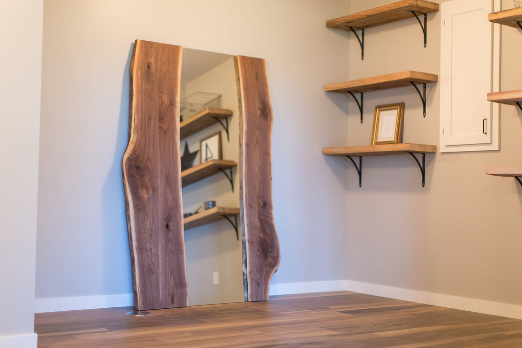 reclaimed mirror and floating shelves in modern farmhouse basement | construction2style