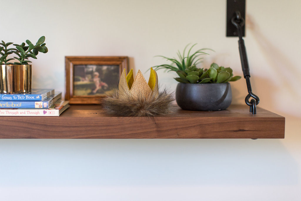 decorated floating shelf in a custom home in Minneapolis designed by construction2style | shelfology shelves 