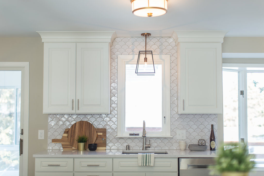 white Moroccan Fish Scale backsplash by construction2style