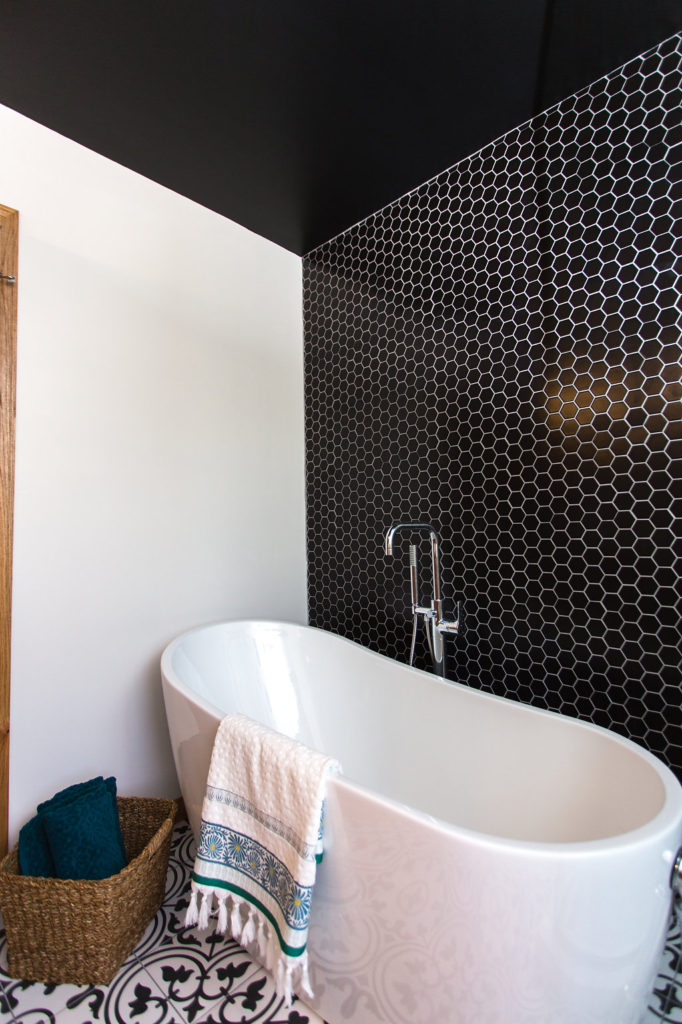 Tricorn black by HGTV Sherwin Williams | ARTEA 9.75" X 9.75" PORCELAIN FIELD TILE IN BLACK/WHITE | black hexagon tile Tile Shop | modern bathroom with a spa like feel | construction2style