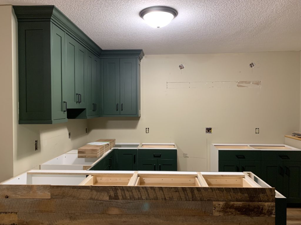 Green cabinets | reclaimed wood | basement bar | construction2style