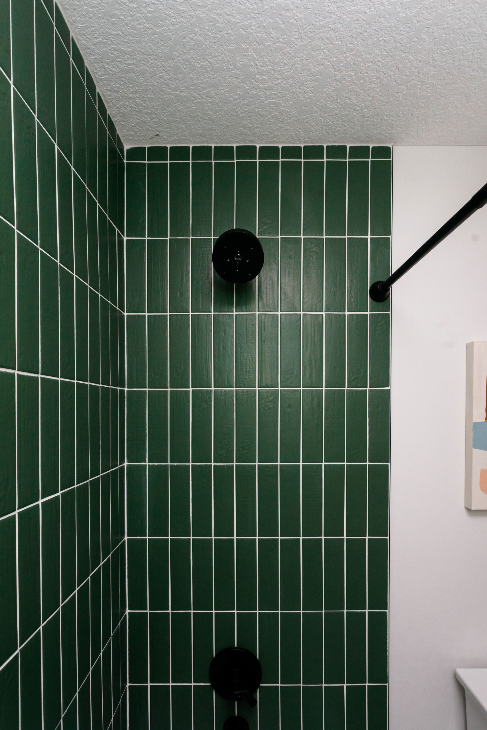 stacked vertical subway tile in the shower