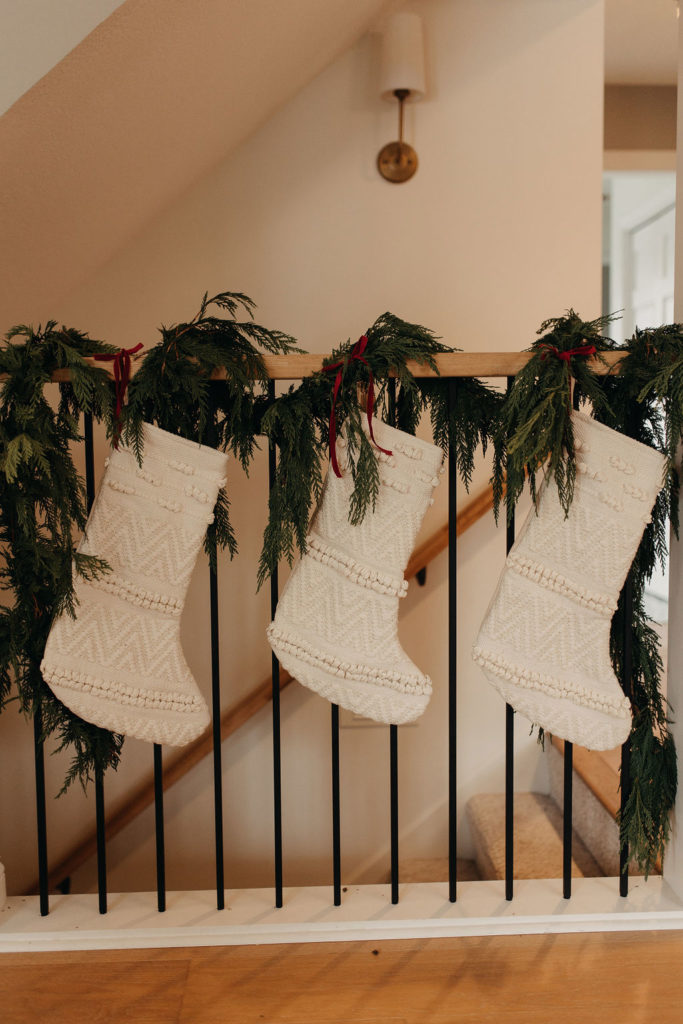 a group of stockings on a railing