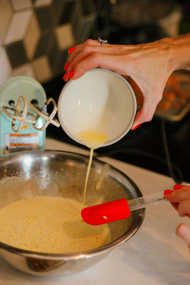 adding melted butter to Biscotti mixture