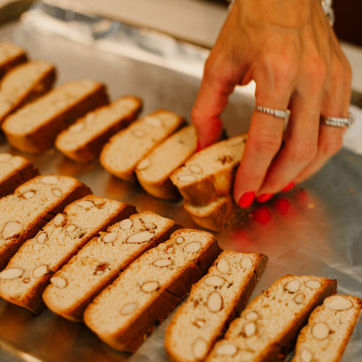 laying out individual biscotti to bake it the second time