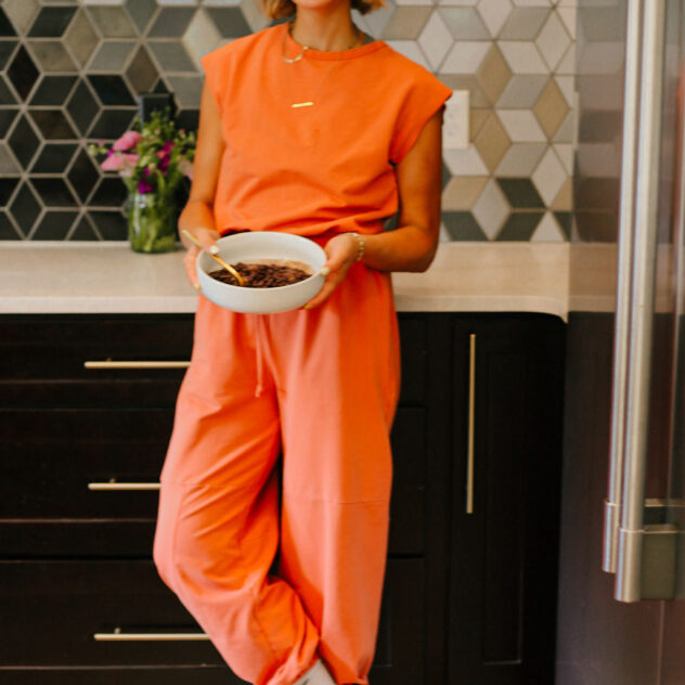 Morgan Molitor, c2s is holding a bowl of black beans, ready to serve.