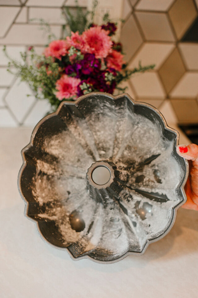 sour cream coffee cake recipe | coat your bundt pan with butter and flour 