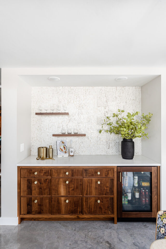 dry bar design ideas with floating shelves and wallpaper | custom home in the suburb of Minneapolis