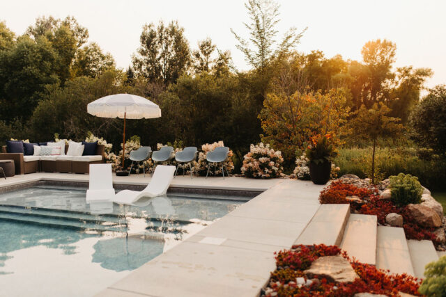 outdoor living: pool with multiple seating arrangements is a big component of the future of interior design and 2025 interior design trends; 