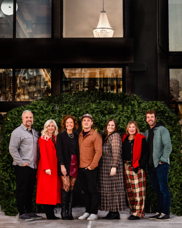 a photo of construction2style crew in front of puttshack in edina right before our christmas party with spouses