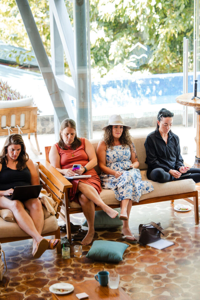 a photo of Stephanie Dailey a licensed General contracor specializing in large custom homes with her three colleagues attending buildher retreat in costa rica
