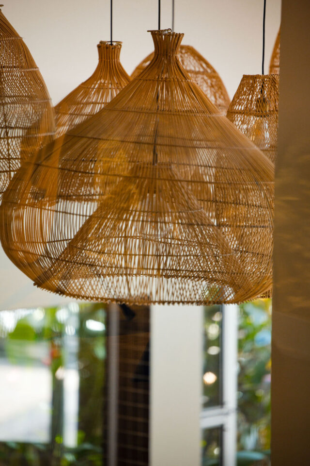 a photo of many beautiful rattan lampshades in a villa in costa rica | buildher retreat 2025 