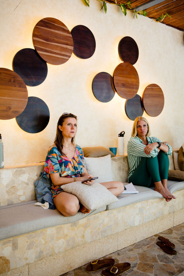a female contractor asking presenter a question at buildher retreat in 2025 in costa rica