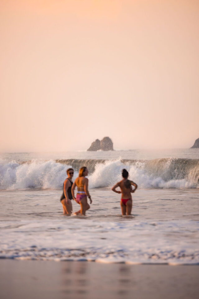Morgan Molitor of construction2style and her two colleagues, female contractors, are enjoying the ocean at contractor conference for women in Costa Rica called buildher retreat 2025