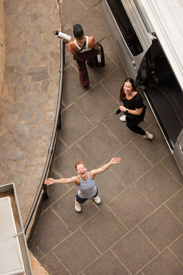 a photo of three female contractors by the van about to head to the airport after buildher retreat in costa rica 