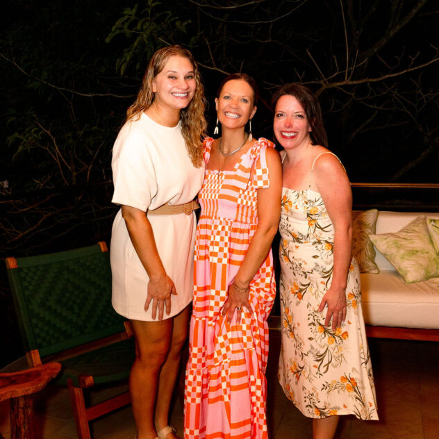 A photo of Morgan Molitor from construction2style, Meghan Billings from Meg & Co, and Allyson Case Anderson from Integro Builders right after dinner attending a retreat for women in Costa Rica in March of 2025