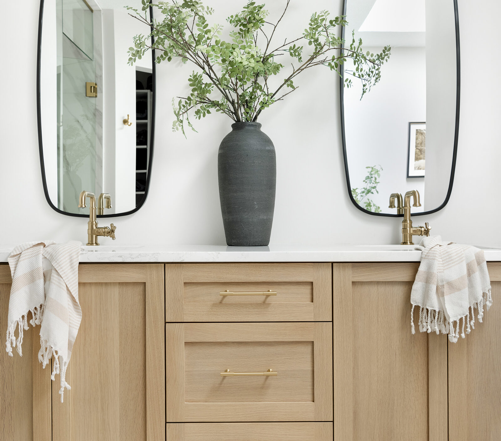 a beautiful double vanity in a primary bathroom | construction2style